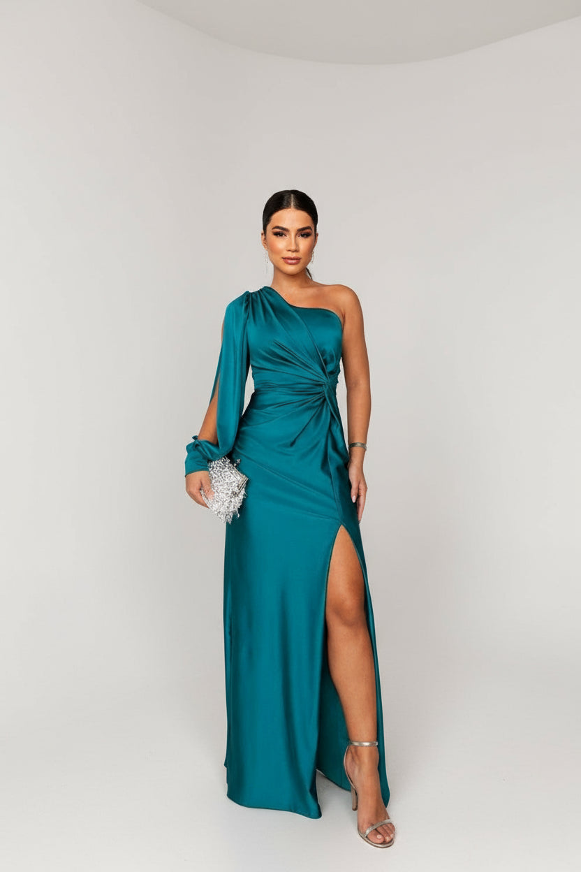 Teal one-shoulder knotted maxi dress with a front split, a stylish vacation dress option.