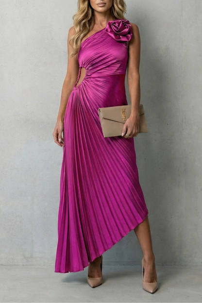 Vibrant fuchsia one-shoulder pleated maxi dress with a stylish side cut-out and shoulder flower detail.