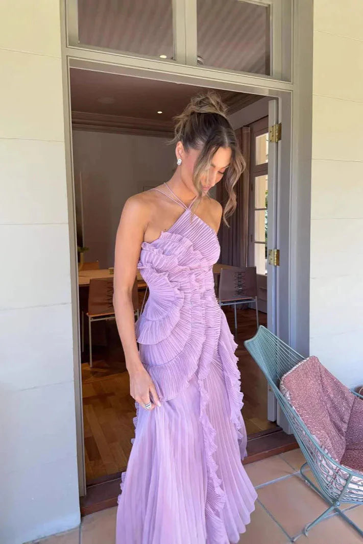 Close-up of the intricate ruffle and pleat details on the bodice of the one-shoulder lilac midi dress.
