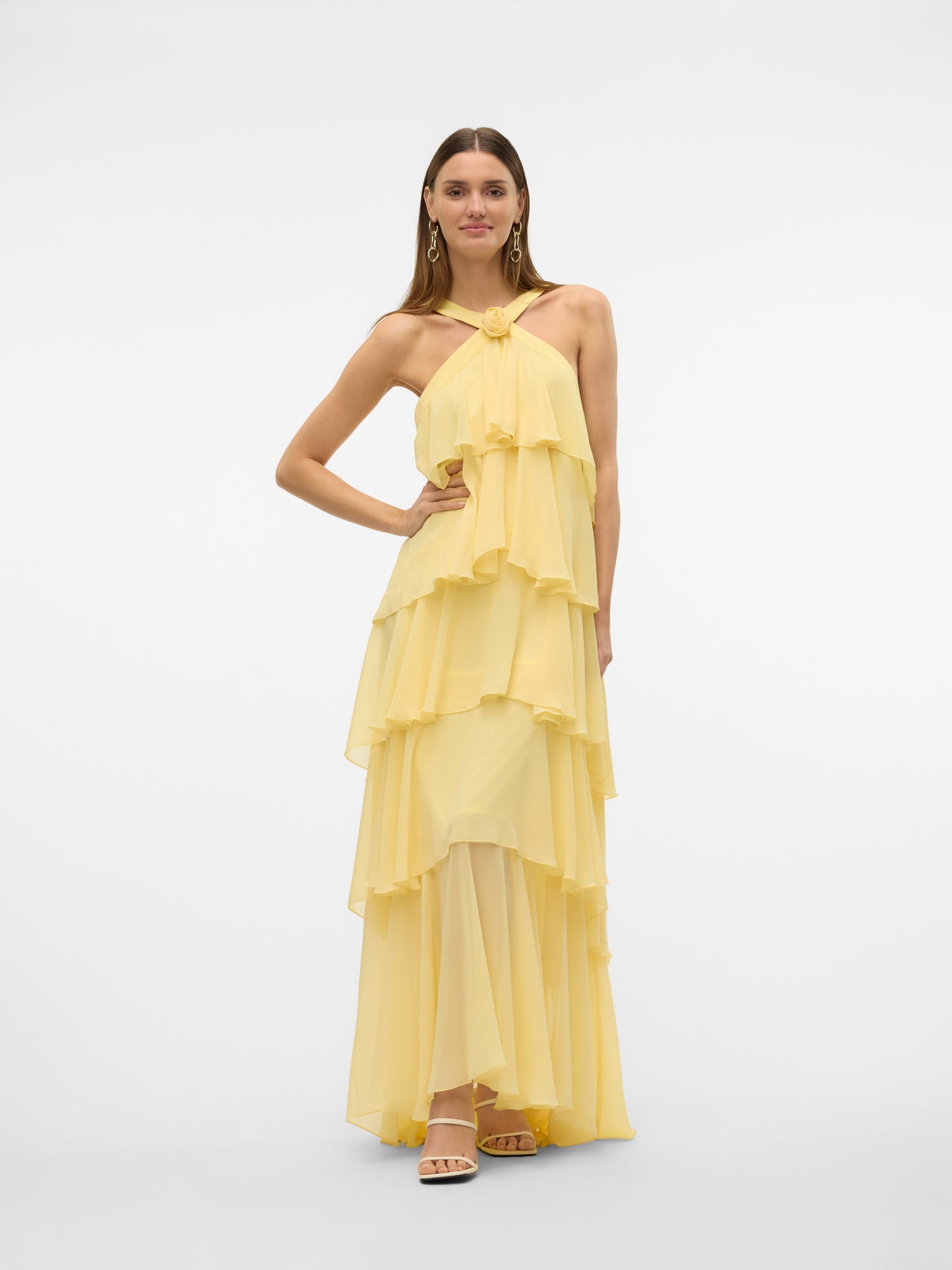 Back flat lay of a yellow halter ruffle backless maxi dress, showing the criss-cross back straps, open back, and full tiered ruffle skirt. Excellent for midi dresses for women.