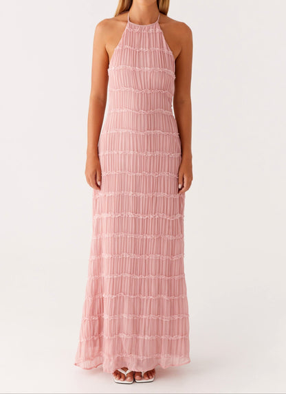 Blush pink pleated halter maxi dress straight-on front view with lace tier stripes