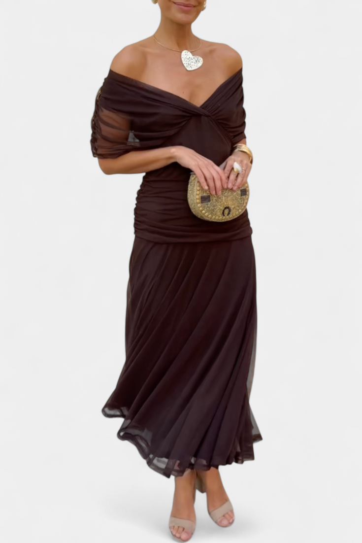 Front view dark brown off shoulder ruched maxi dress with flowing chiffon-style hem and ankle length