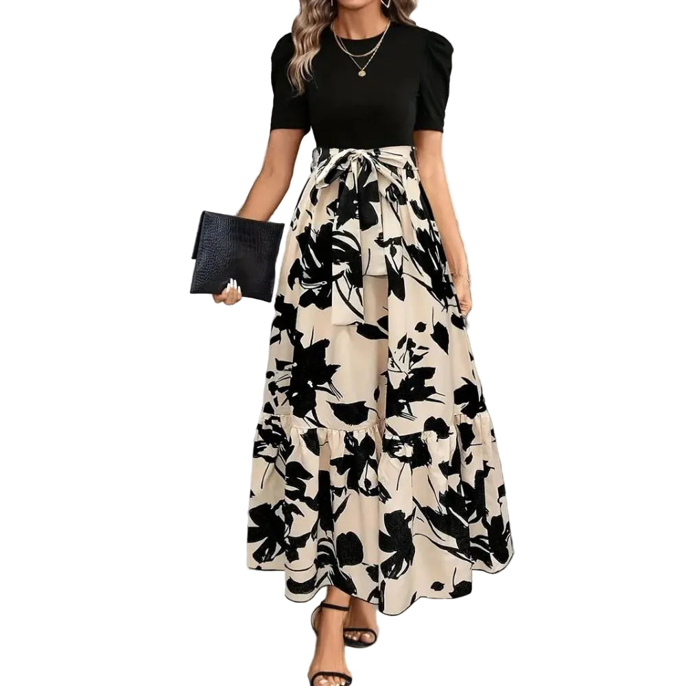 Women's elegant black and beige floral printed maxi dress with puff sleeves and tie waist, perfect for vacation outfits.