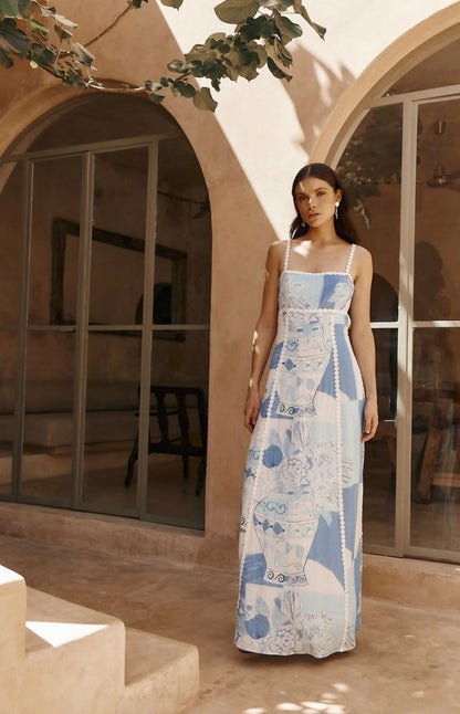 Women's printed ric rac tie back maxi dress in blue and white, showcasing the full length and pattern.