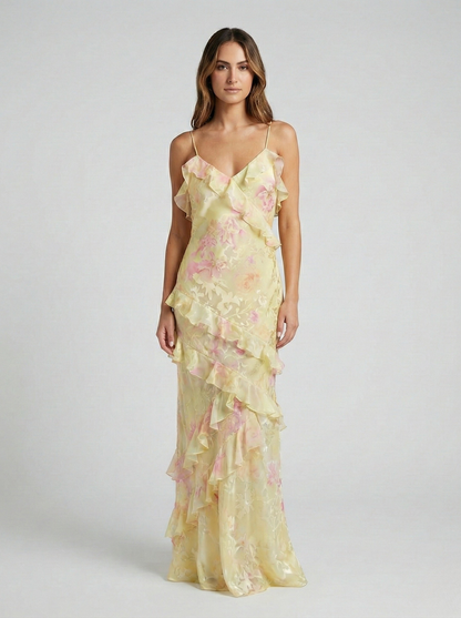 Women's yellow and pink floral maxi dress with tiered ruffles, V-neck, and thin straps.