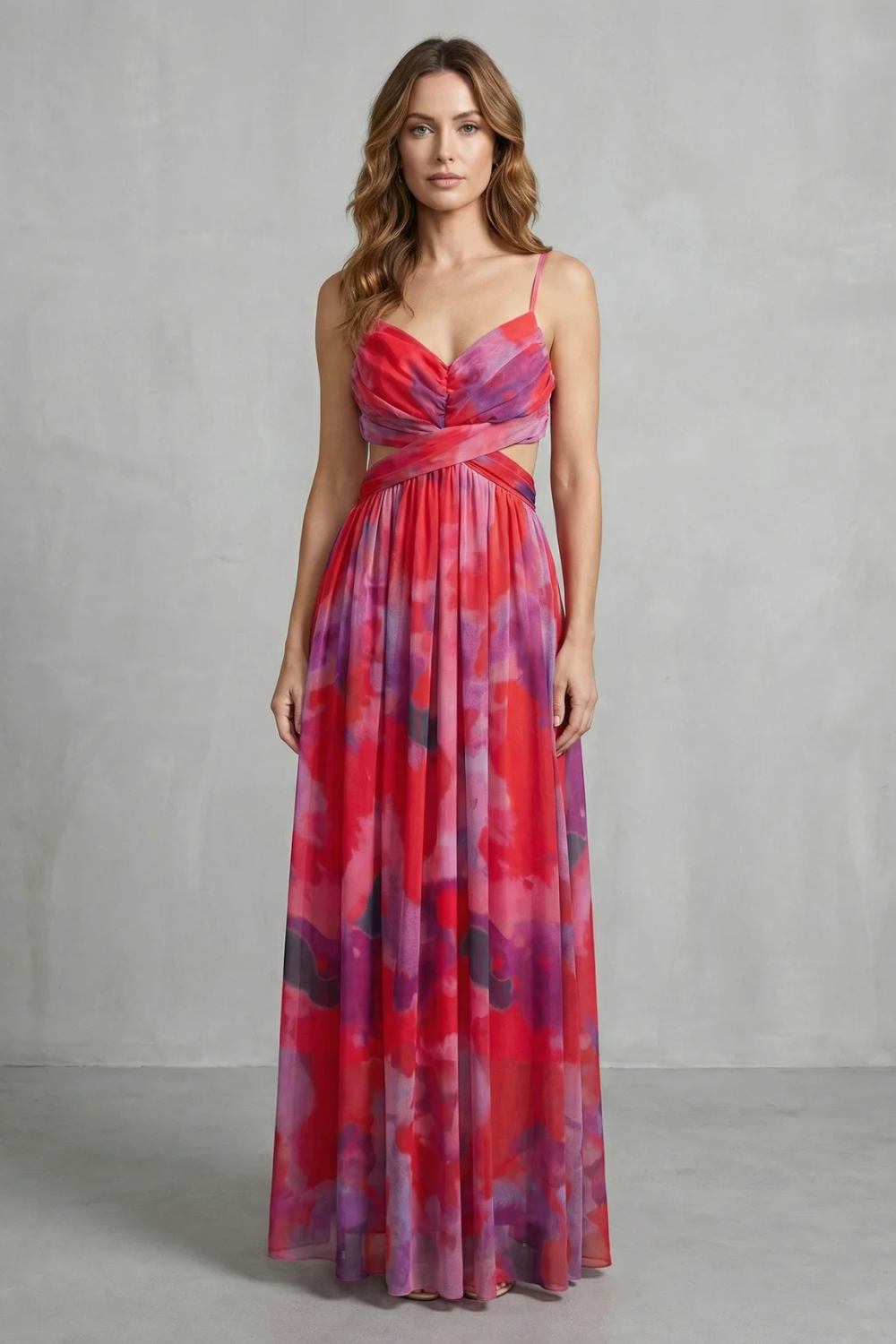 Vibrant red and purple printed formal maxi dress with V-neck, ruched top, and waist cut-outs for women.
