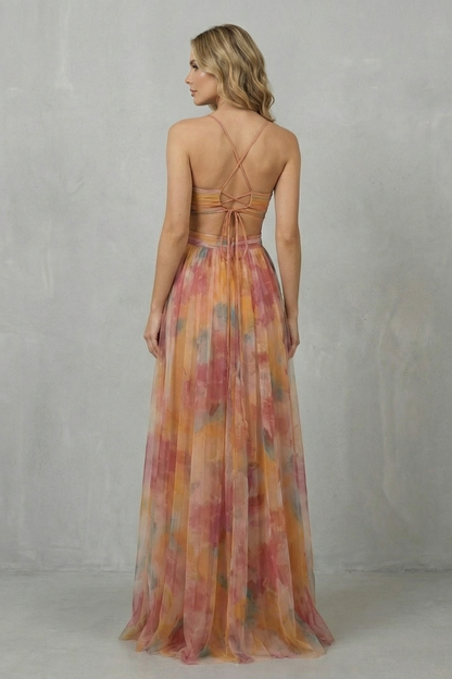 Back view of the women's formal maxi dress, showing the criss-cross spaghetti straps and open back design of the orange, pink, and yellow print.
