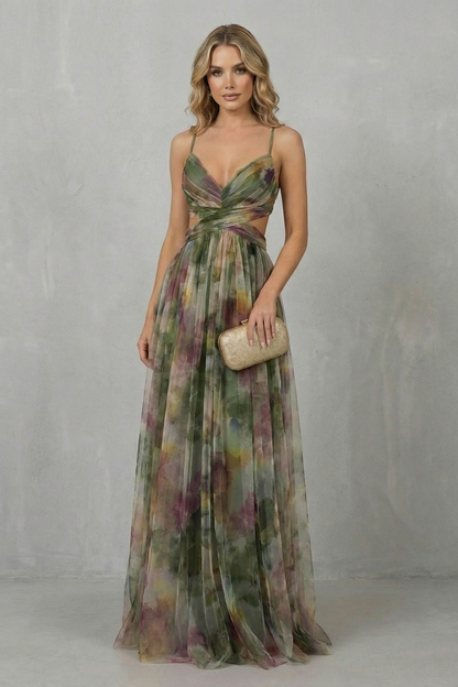 Elegant women's printed V-neck formal maxi dress in a flowing green, purple, and yellow pattern, with subtle waist cut-outs and spaghetti straps.
