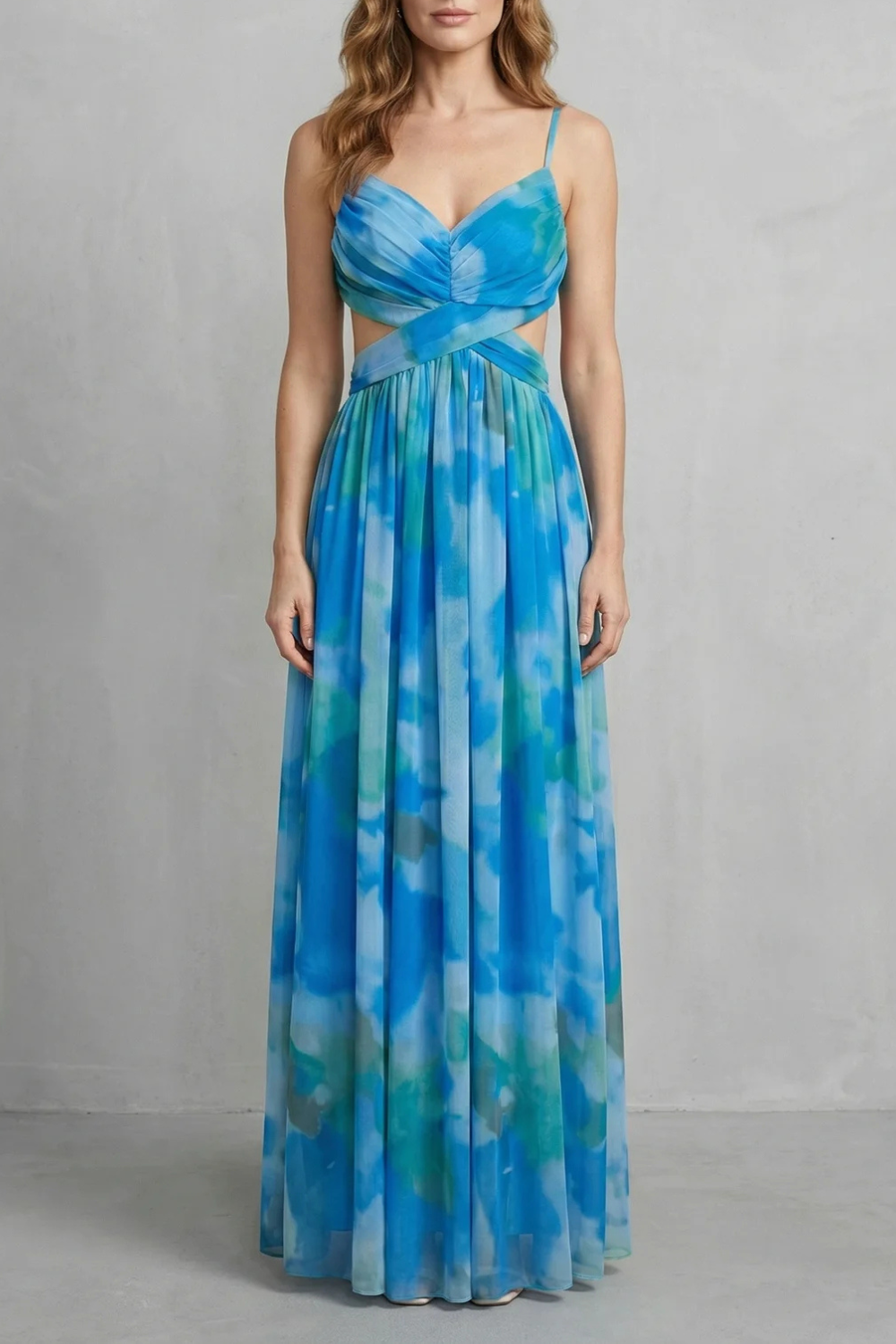 Women's printed V-neck formal maxi dress in a blue and green tie-dye pattern, featuring a flattering V-neck and waist cut-outs.