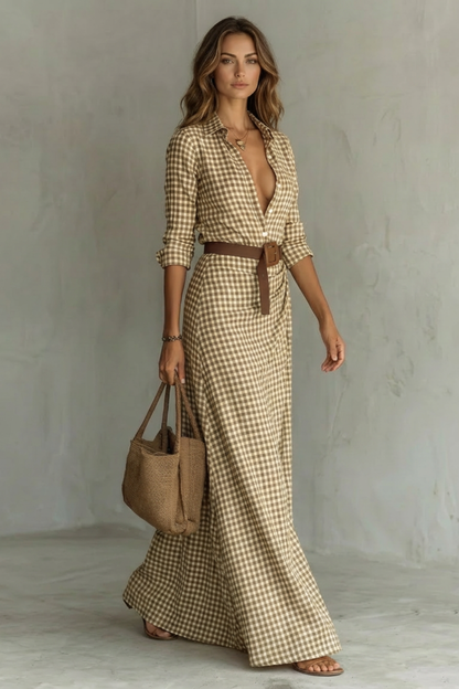 Side view of a women's brown and white gingham printed maxi dress with a deep V-neck, long sleeves, and a brown belt.