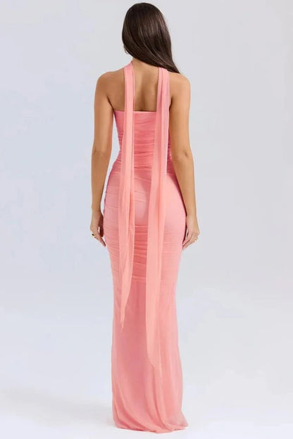 Back view of the Hailey pink maxi dress showing the detachable scarf detail and ruched body.