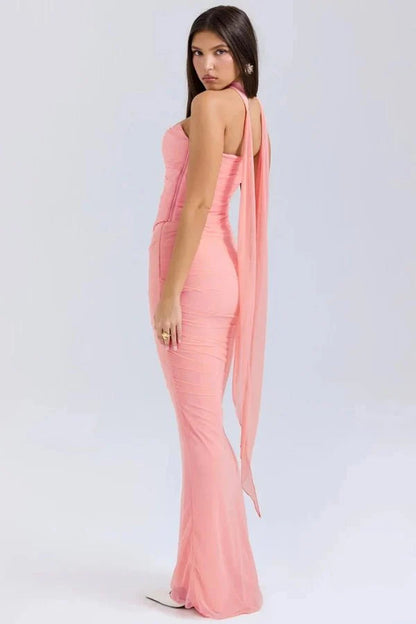 Side and back profile of the Hailey pink strapless gown showing the ruched mesh fabric, corset bodice, and mermaid silhouette.