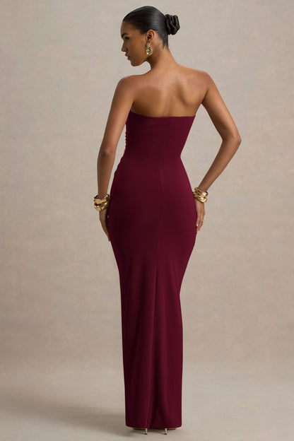 Back view burgundy off shoulder slinky jersey maxi dress with smooth back and fitted bodycon silhouette