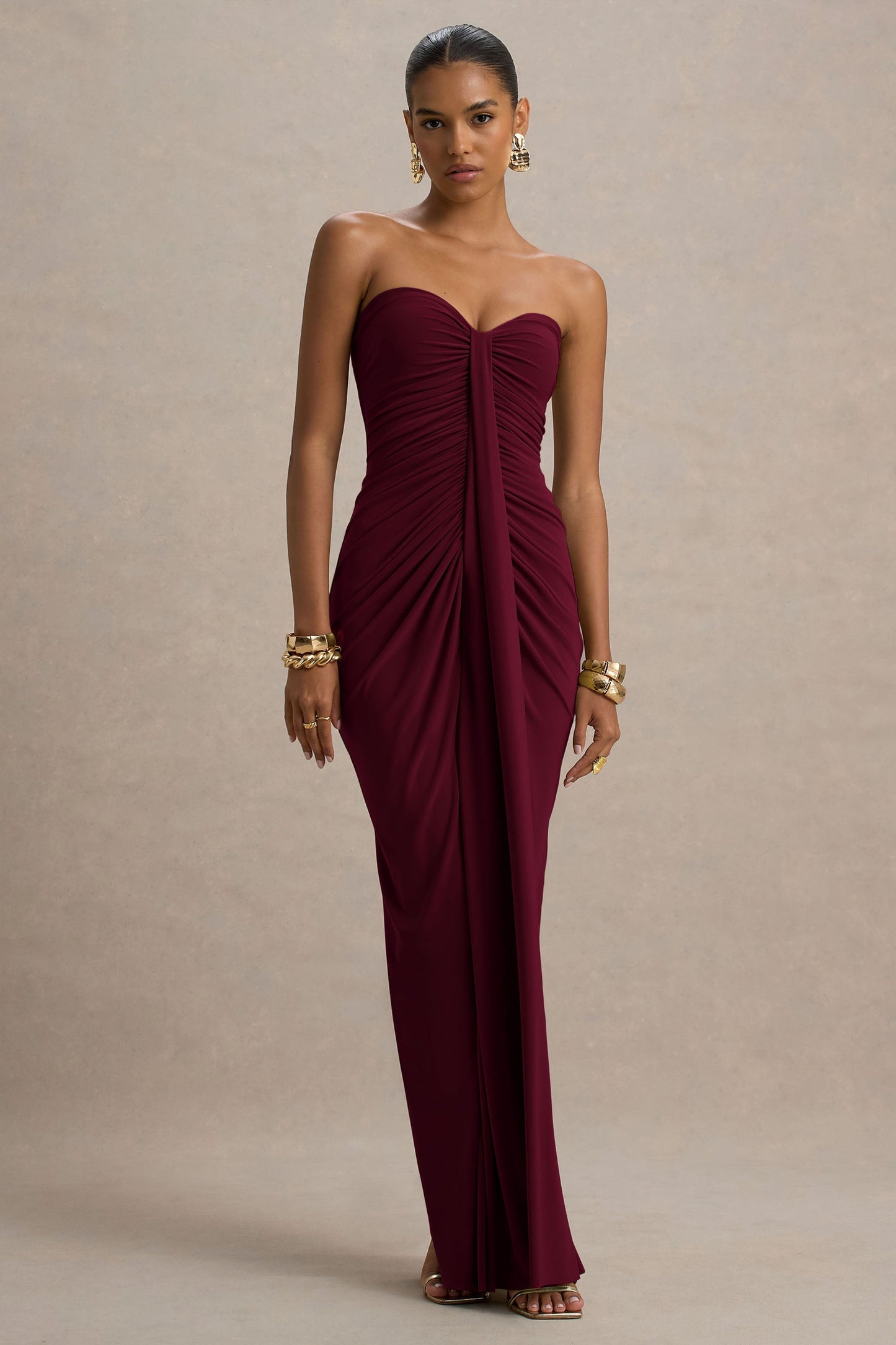 Burgundy off shoulder slinky jersey bodycon maxi dress with ruched bodice and long front drape