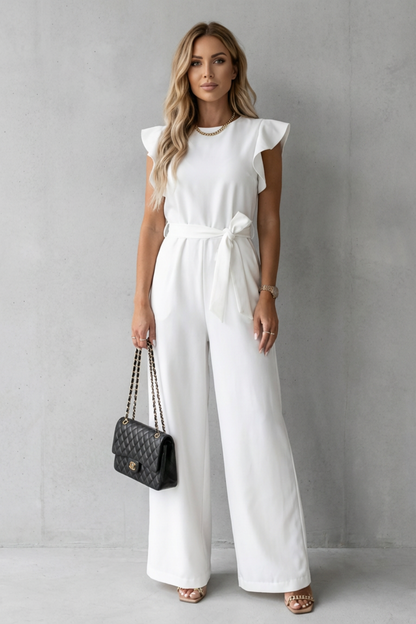 Front view of a white ruffle sleeve wide leg jumpsuit with a tied belt, ideal for elegant occasions.