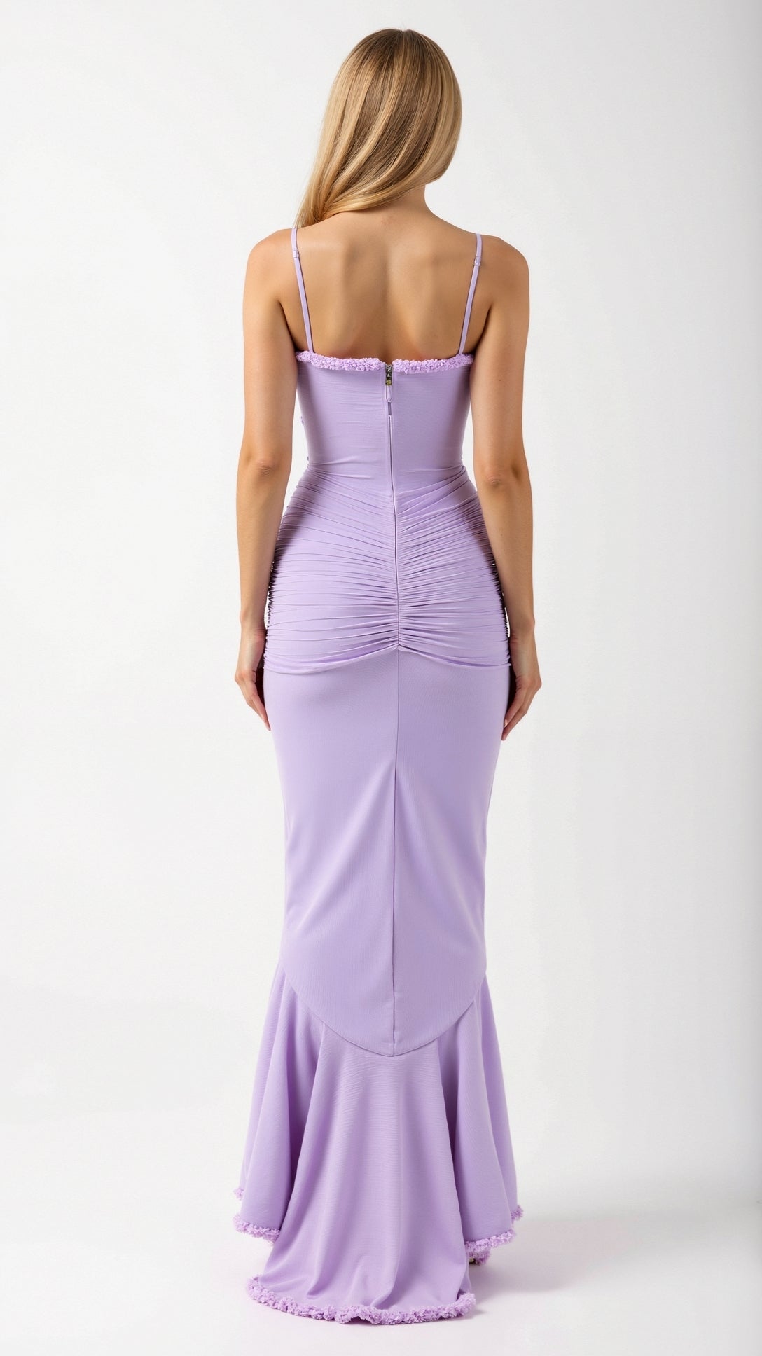 Back view of a women's purple sleeveless ruched ruffle high-low maxi dress with delicate spaghetti straps and a zipper closure.