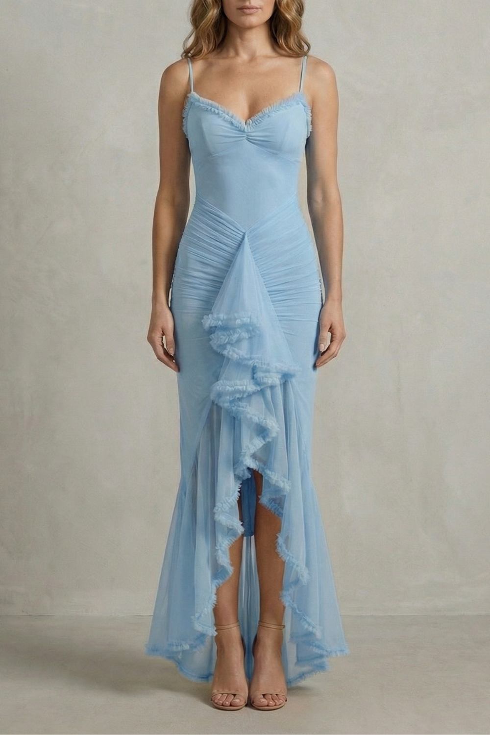 Front view of a light blue sleeveless ruched ruffle maxi dress, with a unique ruched bodice and flowing skirt, suitable for vacation outfits.