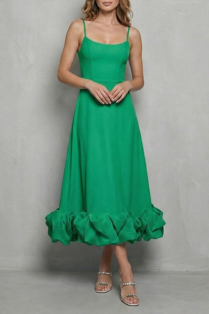 Vibrant green sleeveless midi dress with a fitted bodice and a playful ruffled hem, a stylish choice for vacation outfits or a beach dress for women.