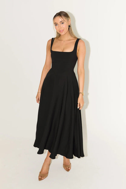 Black square neck sleeveless midi dress with a full, elegant skirt, ideal for womens wedding guest dresses.