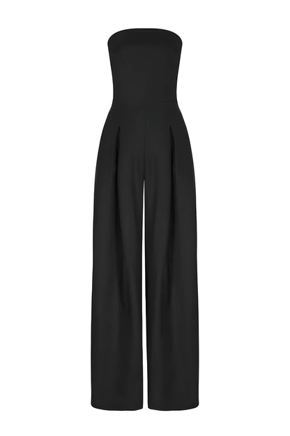 Front view of a black strapless high-waisted wide-leg jumpsuit, with visible pleats at the waist and a clean silhouette, on a white background.