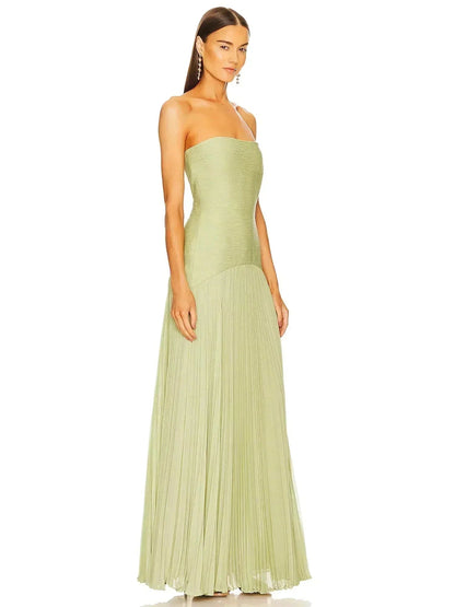 Women light green strapless maxi dress side angle view highlighting the fitted bodice and skirt pleats