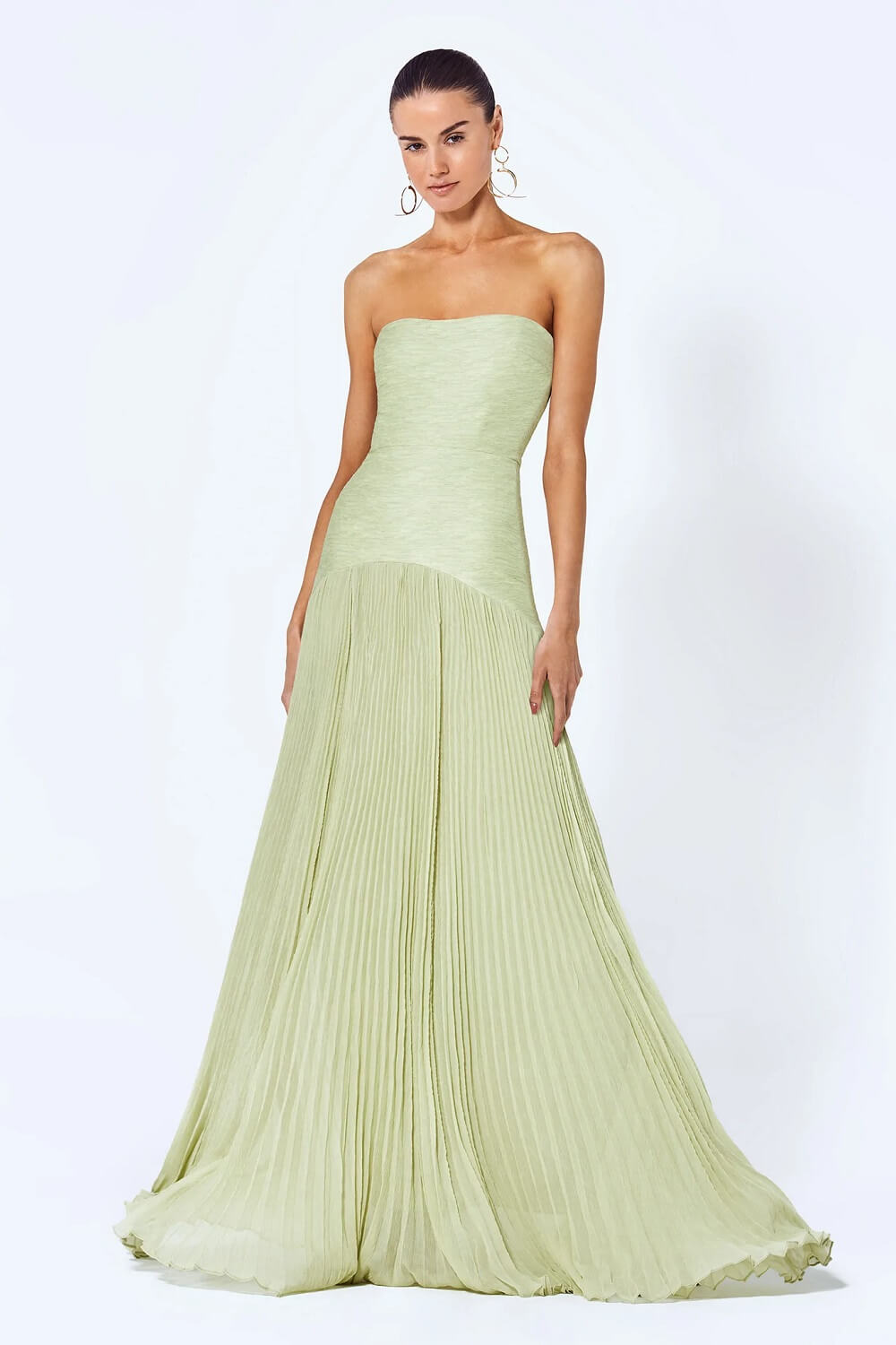 Women light green strapless maxi dress with fitted bodice and flowing pleated skirt from front view