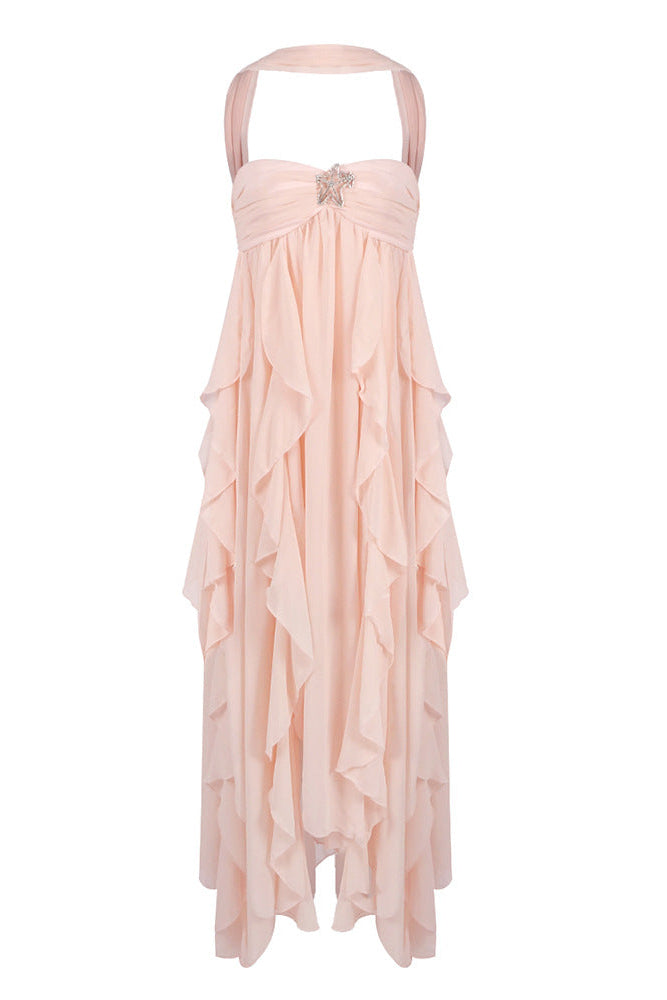 Peach strapless ruched ruffle maxi dress with a halter neckline and a sparkling star detail on the bodice, front view.