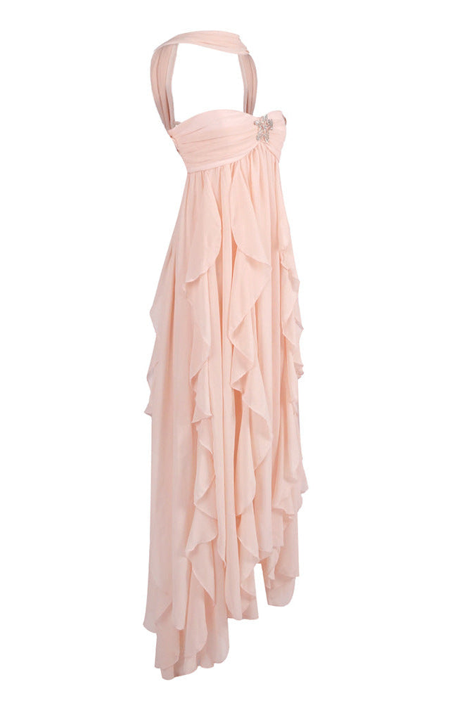 Side view of the peach strapless ruched ruffle maxi dress, showcasing the tiered ruffles and halter neckline.