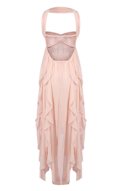 Back view of the peach strapless ruched ruffle maxi dress, featuring a low back and flowing tiered ruffles.