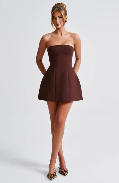 Brown strapless seamed bubble mini dress, front view, featuring a flattering fitted top and bubble hem.
