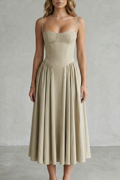 Beige structured sweetheart neck midi dress with slim straps and a pleated A-line skirt, a versatile midi dress.