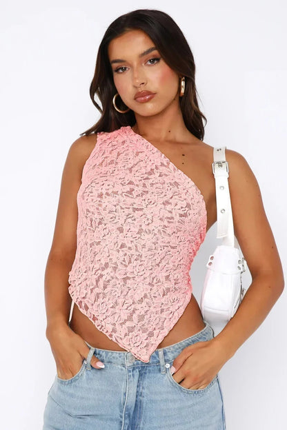 Pink one shoulder lace crop top, front view with pointed hem for summer wedding guest outfit