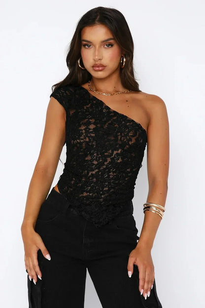 Black one shoulder lace crop top with pointed hem, front view styling for summer wedding guest