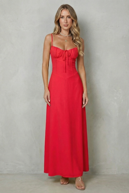 Full-length front view of a women's striking red maxi dress, featuring a sweetheart neckline and a form-fitting bodice.