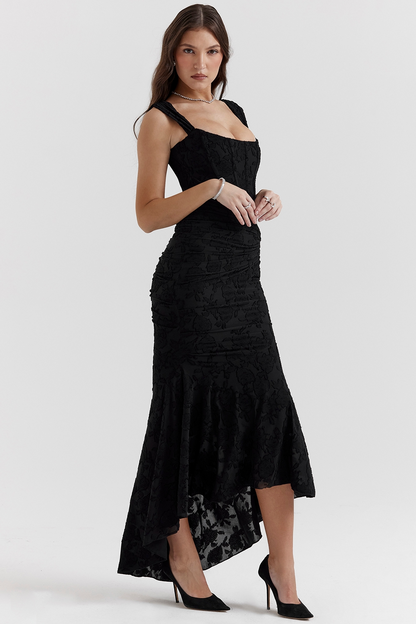Elegant black floral lace midi dress with ruched bodice and high-low hem, perfect for wedding guests.
