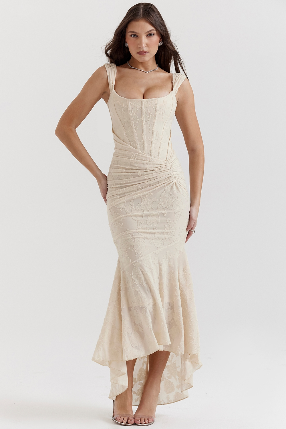 Full length shot of an ivory floral lace midi dress, ideal for elegant dresses for wedding guests.