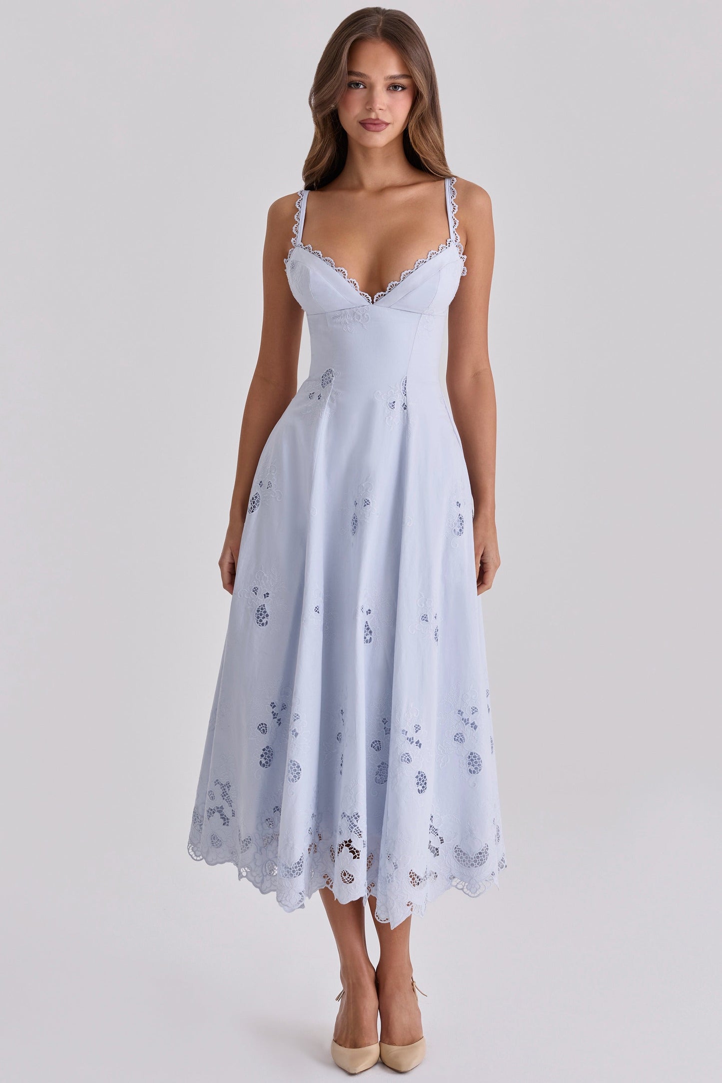 Front view of light blue maxi dress with lace-edged straps, fitted waist, and cutwork hem