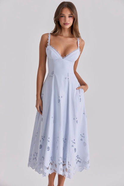 Light blue maxi dress angled view showing v-neck lace trim, flared skirt, and eyelet hem