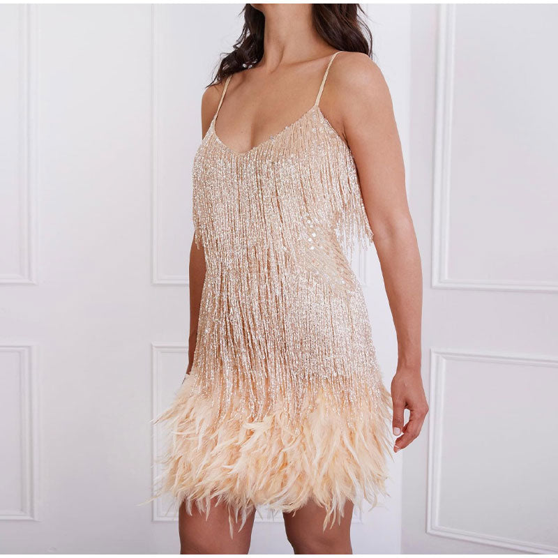 Champagne V-neck sequin feather mini dress, featuring a sparkling sequin bodice and feather skirt.