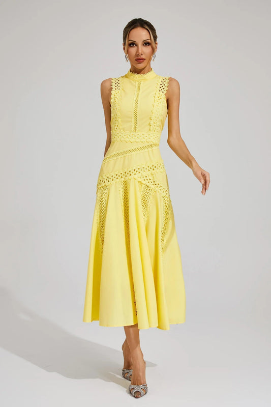 Bright yellow sleeveless midi dress for women featuring a high neck and intricate cutwork details on the bodice and skirt.