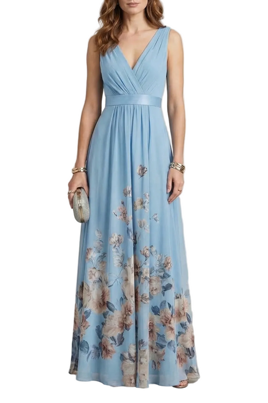 Light blue floral maxi dress with a V-neck and pleated bodice, featuring large floral print on the skirt, perfect for wedding guests.