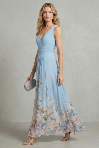Side profile of a light blue floral ombre maxi dress for women, showcasing the elegant drape and v-neckline.