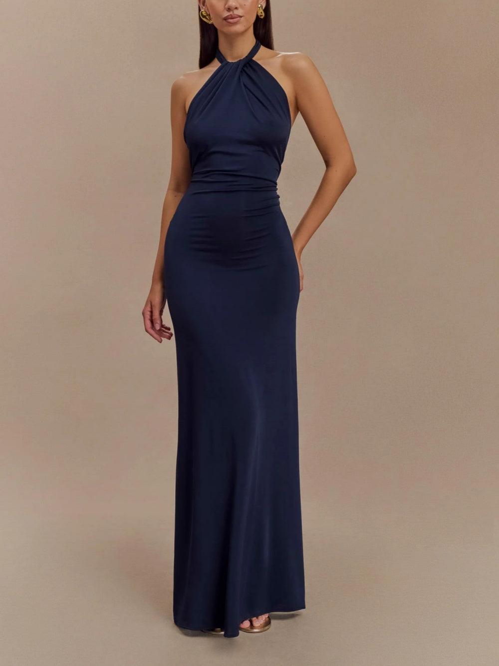 Navy halter ruched maxi dress for wedding guest with bodycon fit, full-length front view
