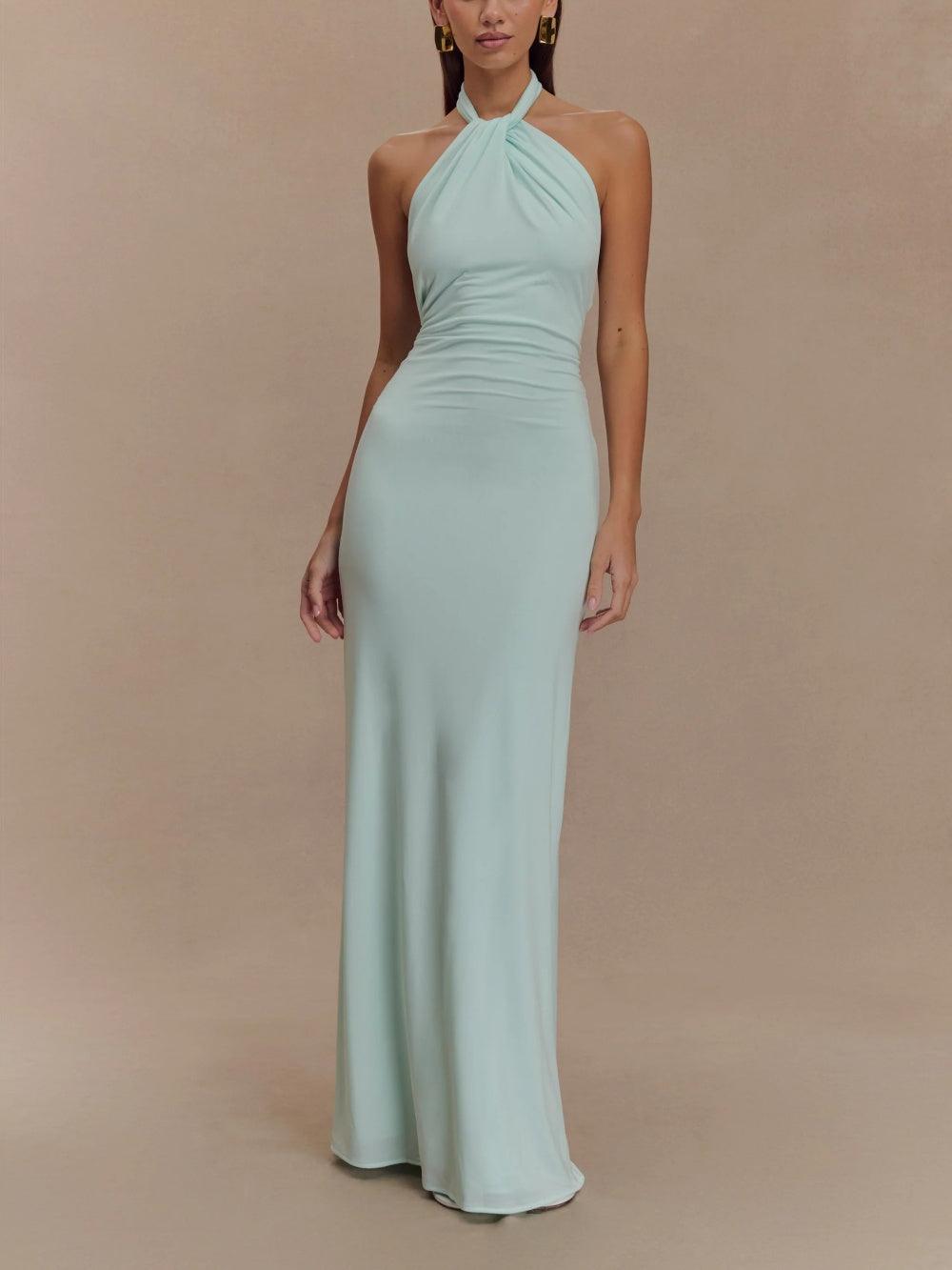 Mint green halter neck ruched maxi dress with fitted bodycon silhouette, full-length front view