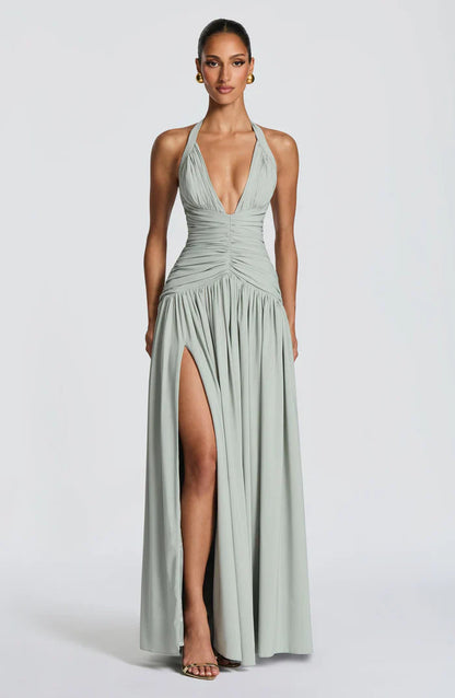 Front view sage green halter V neck backless maxi dress with ruched waist and high leg slit