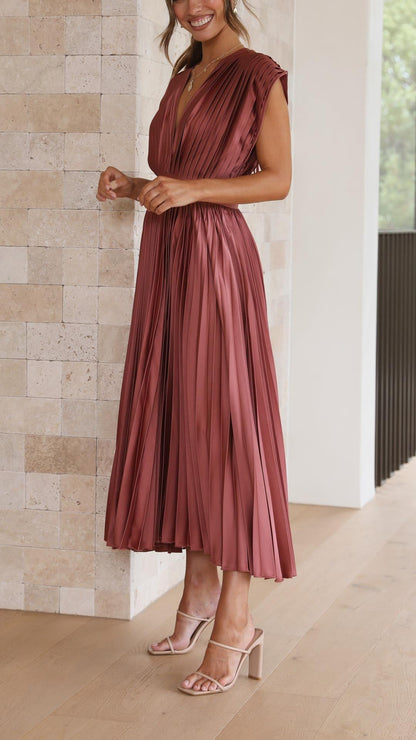 Rosewood women's pleated V-neck midi dress with short sleeves, showcasing the full length of the skirt and its elegant drape, perfect for special occasions.