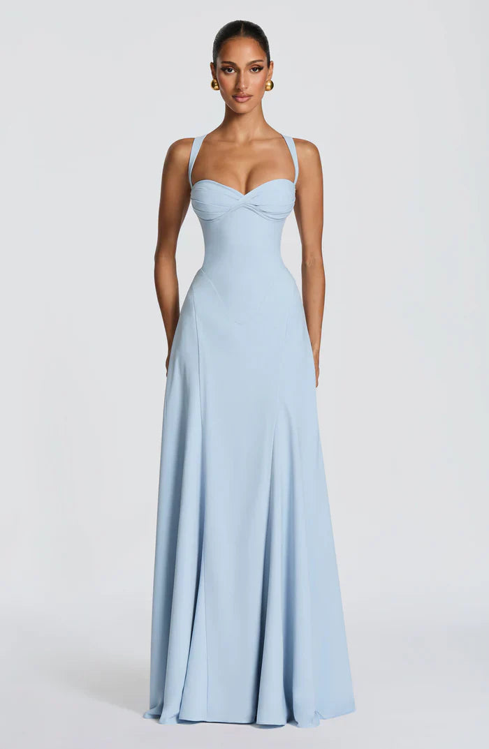 Light blue sweetheart ruched corset maxi dress with wide straps and floor-length flowy skirt, front view