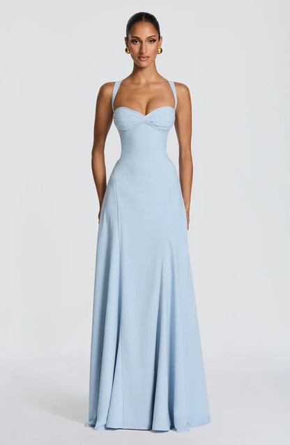Light blue sweetheart ruched corset maxi dress with wide straps and floor-length flowy skirt, front view