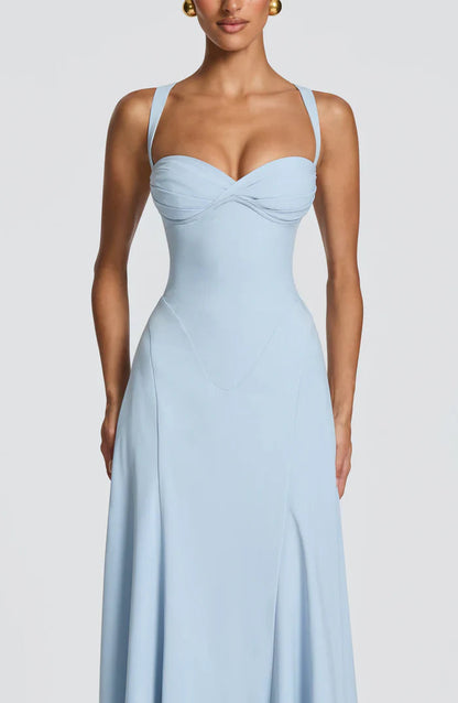 Close-up of light blue sweetheart neckline with ruched bust and structured corset seams on maxi dress
