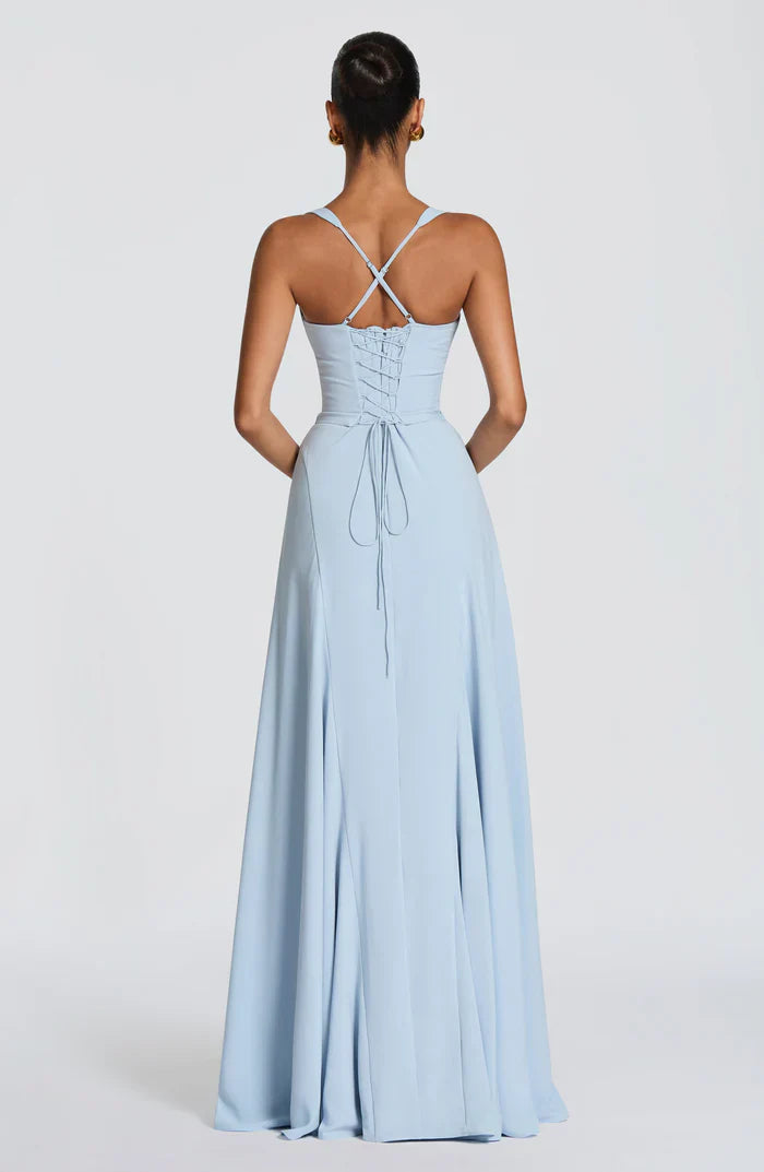 Back view of light blue corset maxi dress featuring crisscross straps and lace-up back for adjustable fit